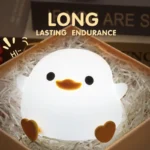 Adorable duck-shaped silicone night light with touch controls, auto timer, and USB charging. Safe, portable, and perfect for kids’ rooms or cozy vibes. Shop now at VibyBuy!